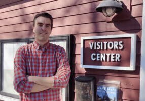 Lanesboro Chamber of Commerce executive director standing outside visitor center